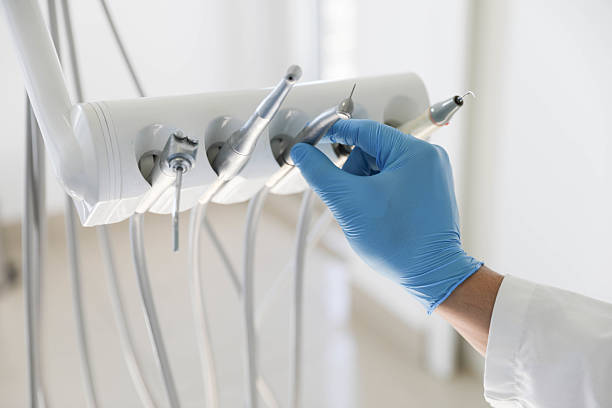 Professional Emergency Dentist technician working in Manistee County County, MI